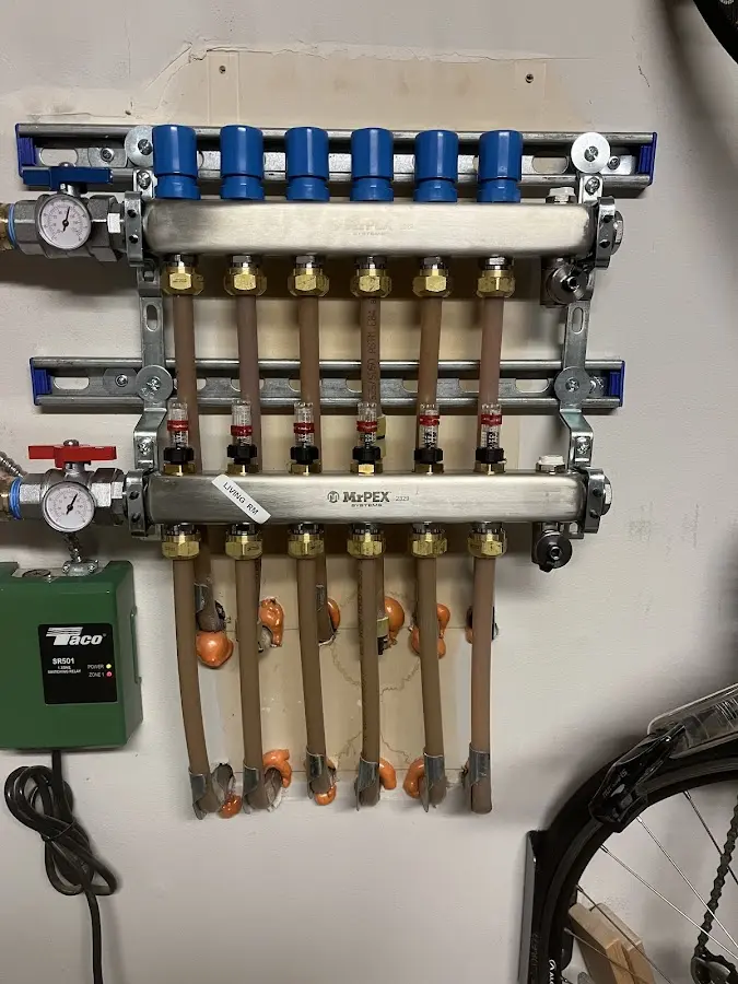 Plumber performing Gas Line Installation at a residential property in Bon Air